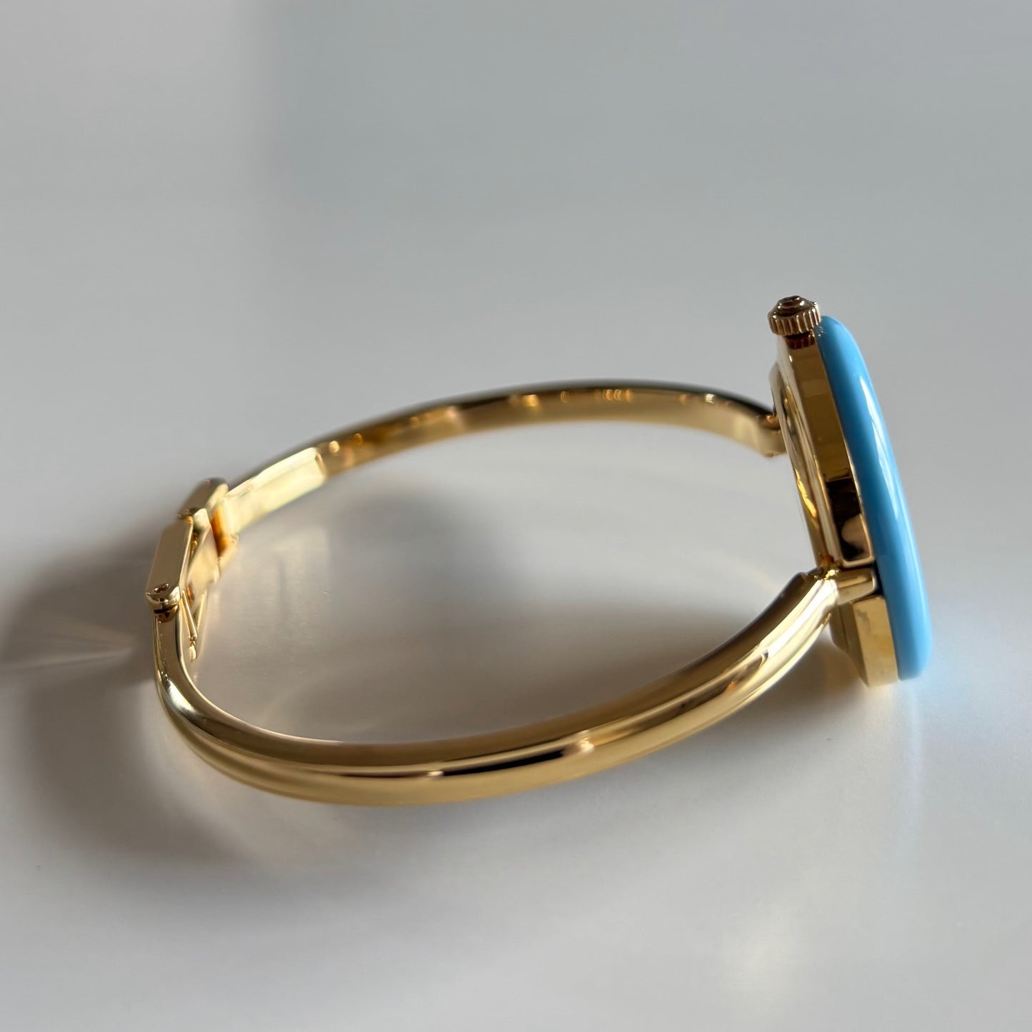 Gucci 1990s Interchangeable Bezel Gold Plated Bangle Watch with 12 bezels, case