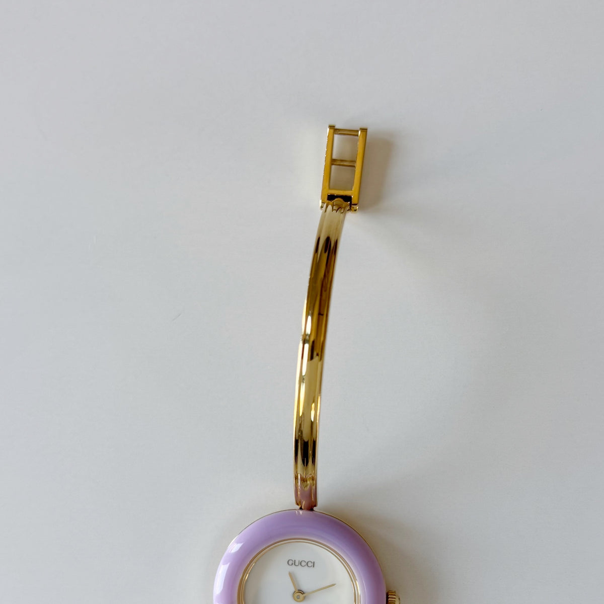 Gucci 1990s Interchangeable Bezel Gold Plated Bangle Watch with 12 bezels, case