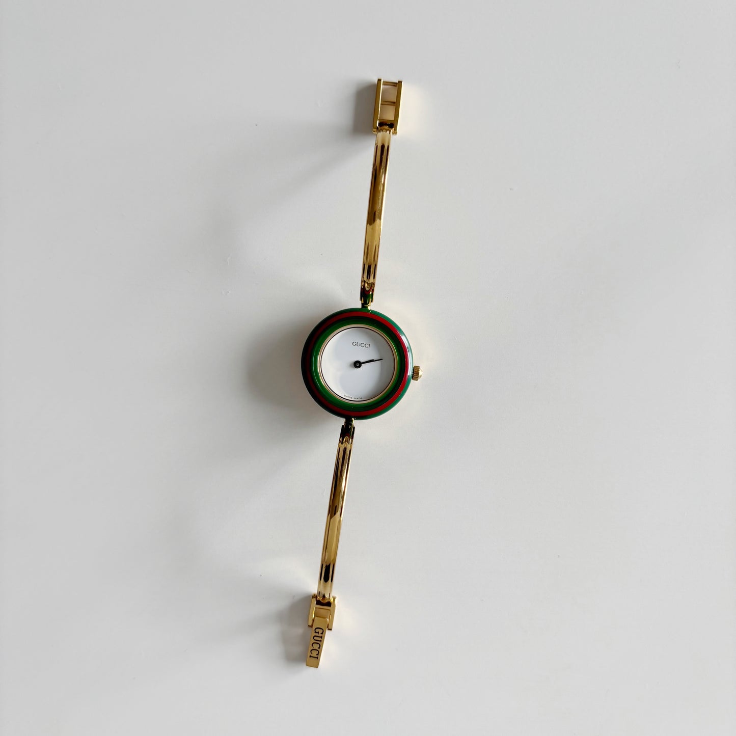 Gucci 1990s Interchangeable Bezel Gold Plated Bangle Watch with 12 bezels, case (Small)