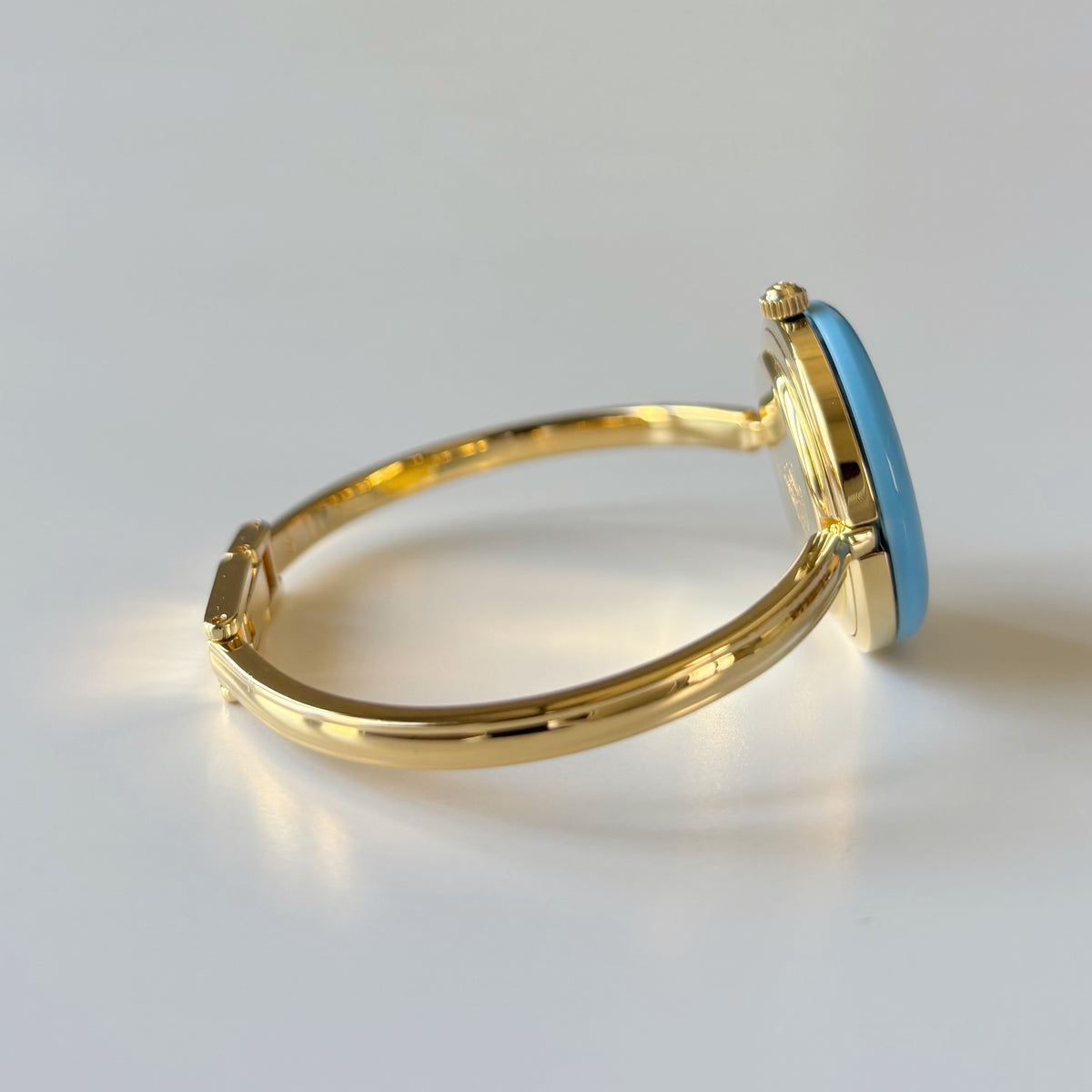 Gucci 1990s Interchangeable Bezel Gold Plated Bangle Watch with 12 bezels, case (Small)