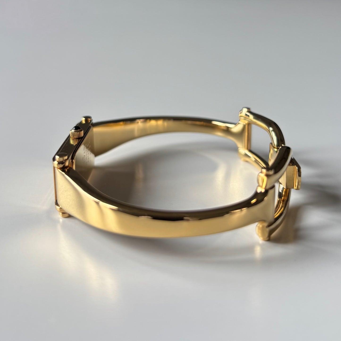 Gucci 1990s Gold Rectangular Dial Gold Plated Bangle Watch