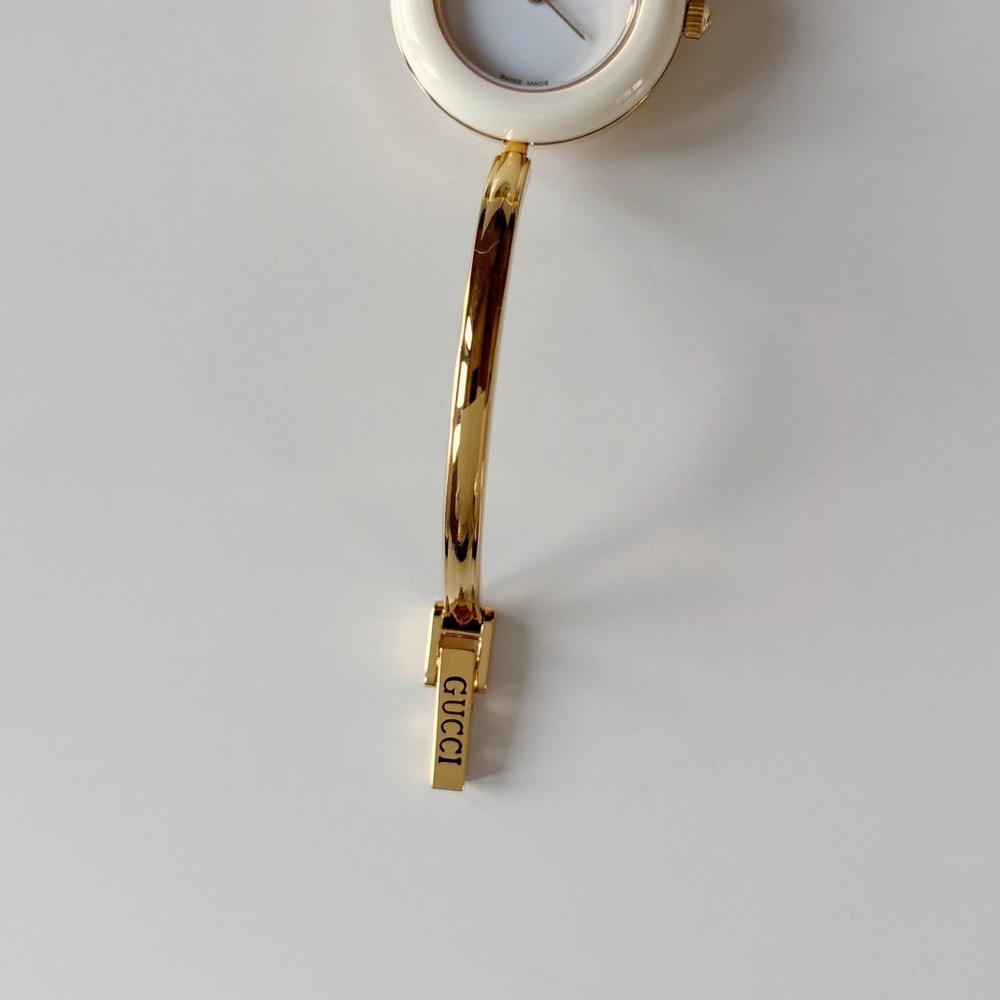 Gucci 1990s Interchangeable Bezel Gold Plated Bangle Watch with case, 12 bezels (Small)