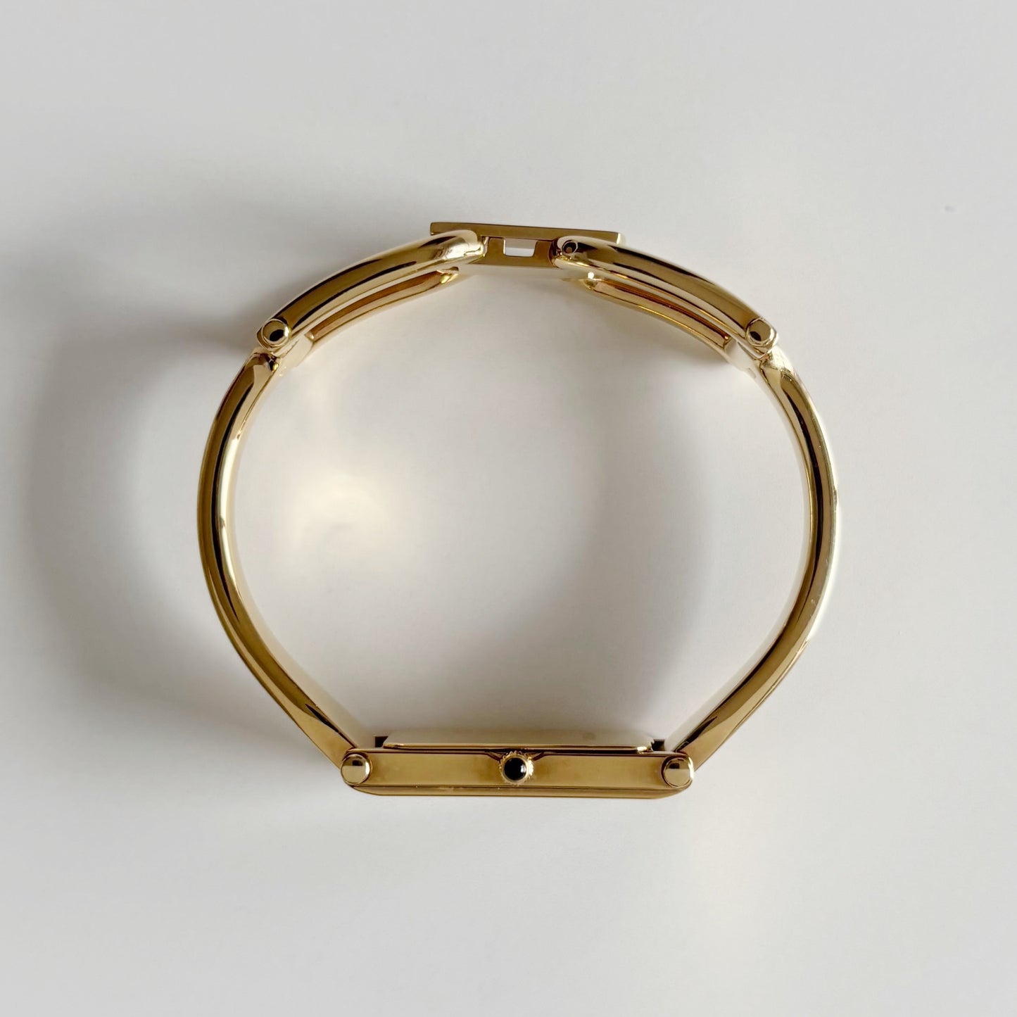 Gucci 1990s Seashell Rectangular Dial Gold Plated Bangle Watch (Small)