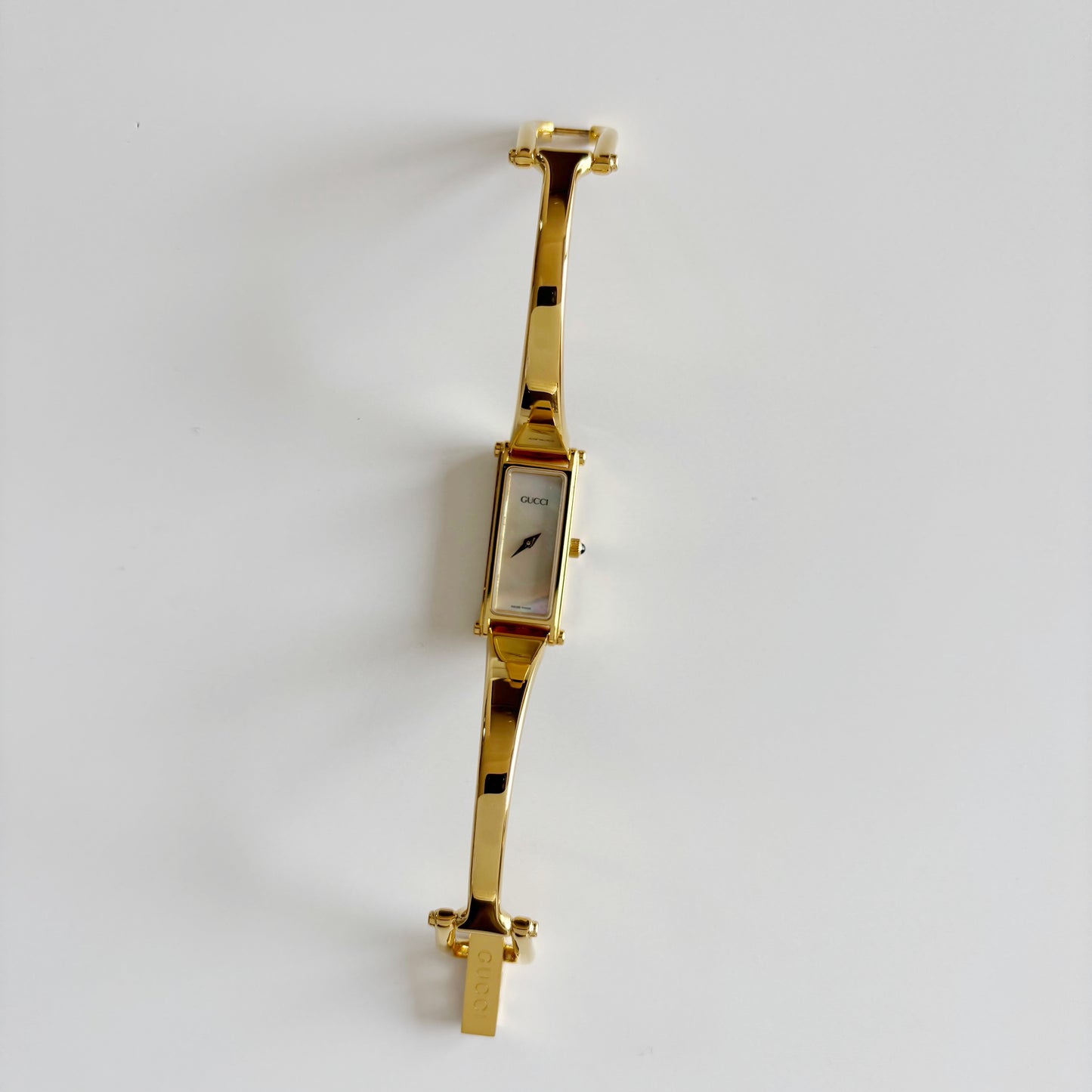 Gucci 1990s Seashell Dial Rectangular Gold Plated Bangle Watch