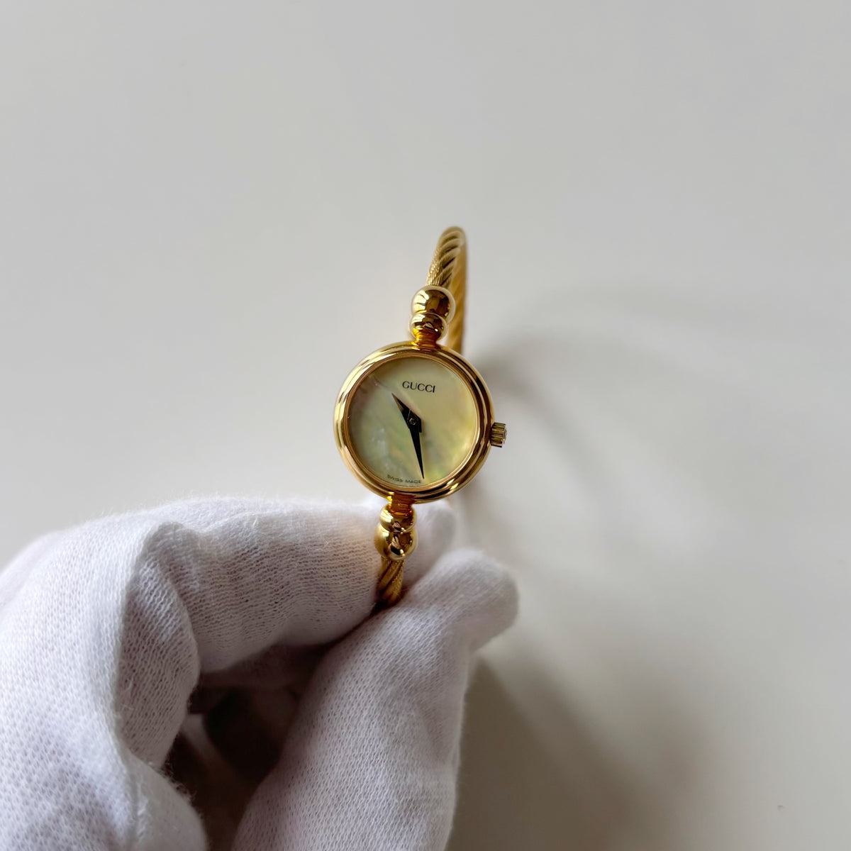 Gucci 1990s Seashell Dial Gold Plated Cable Bangle Watch