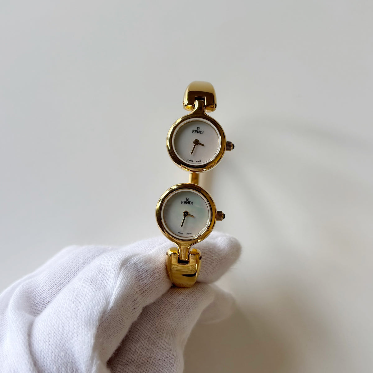 Fendi 1990s Seashell Dial Two Time Zone Gold Plated Bangle Watch