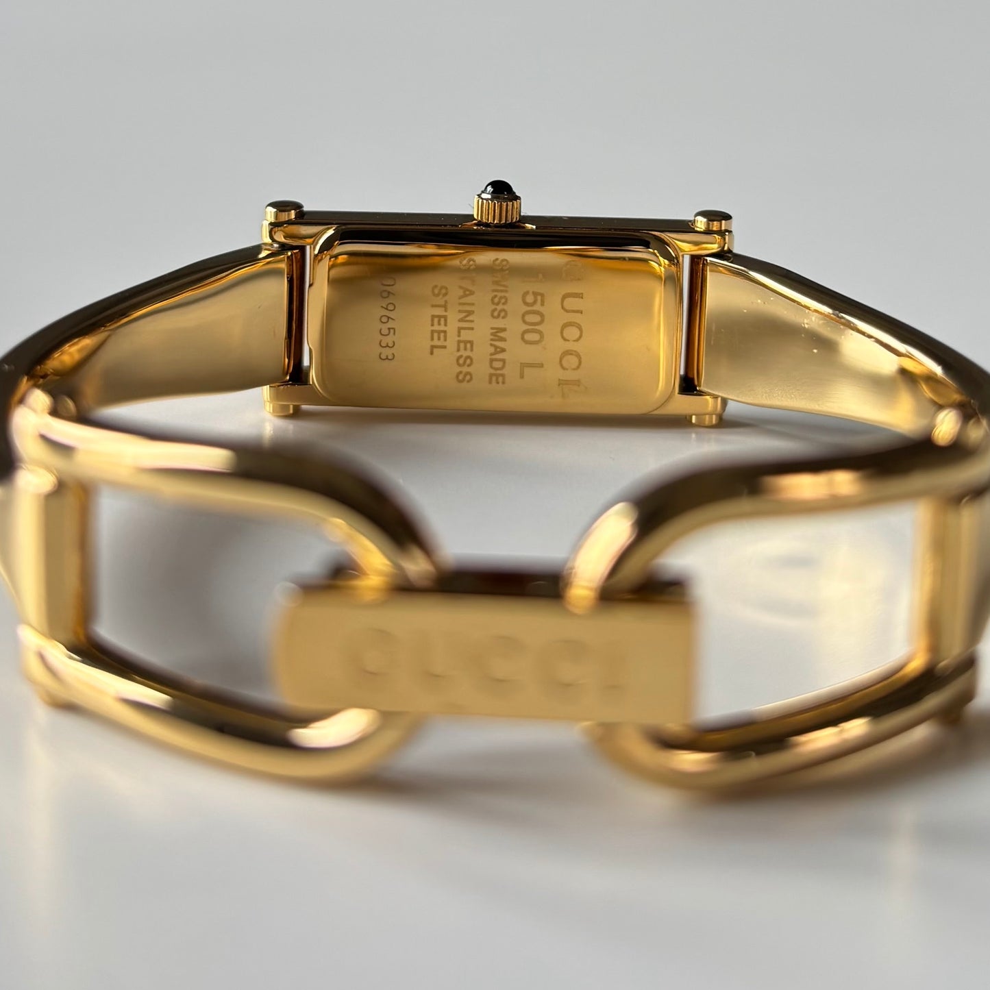 Gucci 1990s Gold Rectangular Dial Gold Plated Bangle Watch (Small)