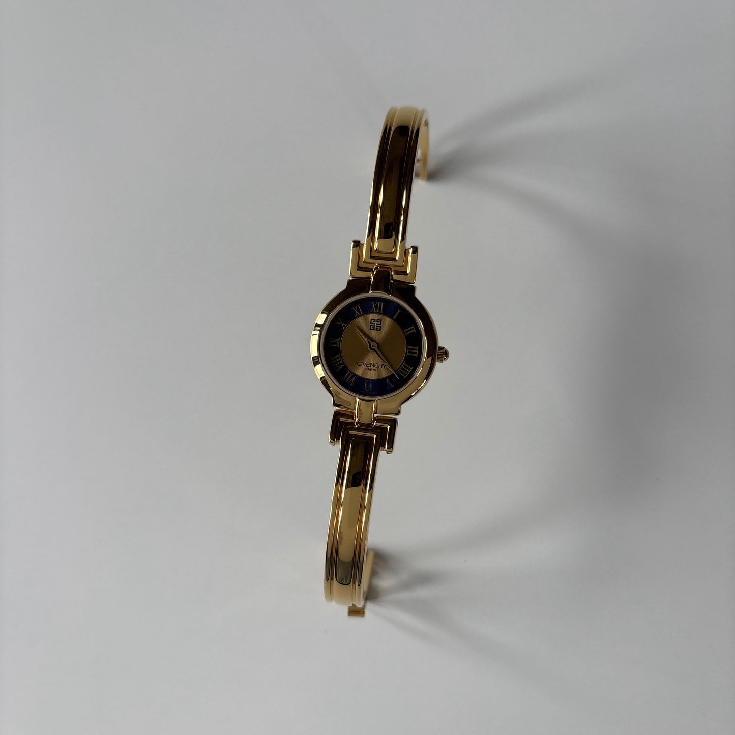 Givenchy 1990s Round Dial Gold Plated Bangle Watch