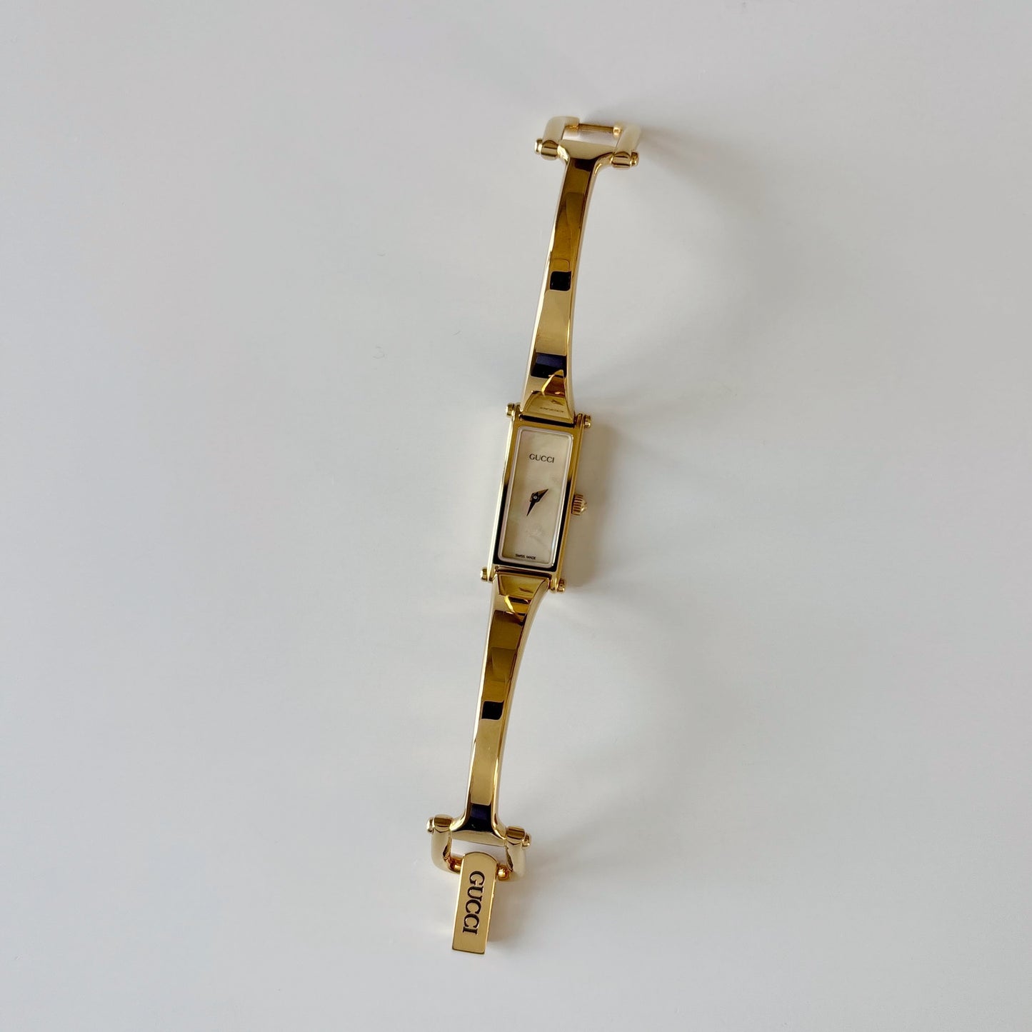 Gucci 1990s Seashell Rectangular Dial Gold Plated Bangle Watch