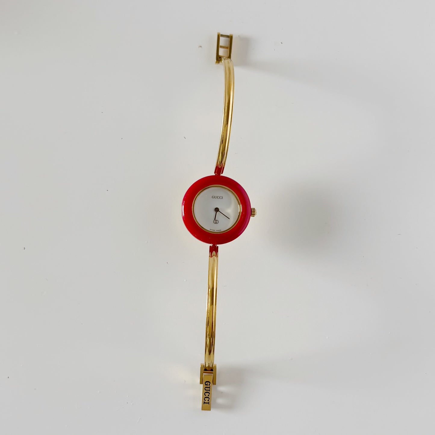 Gucci 1990s Interchangeable Bezel Gold Plated Bangle Watch with 12 bezels, case