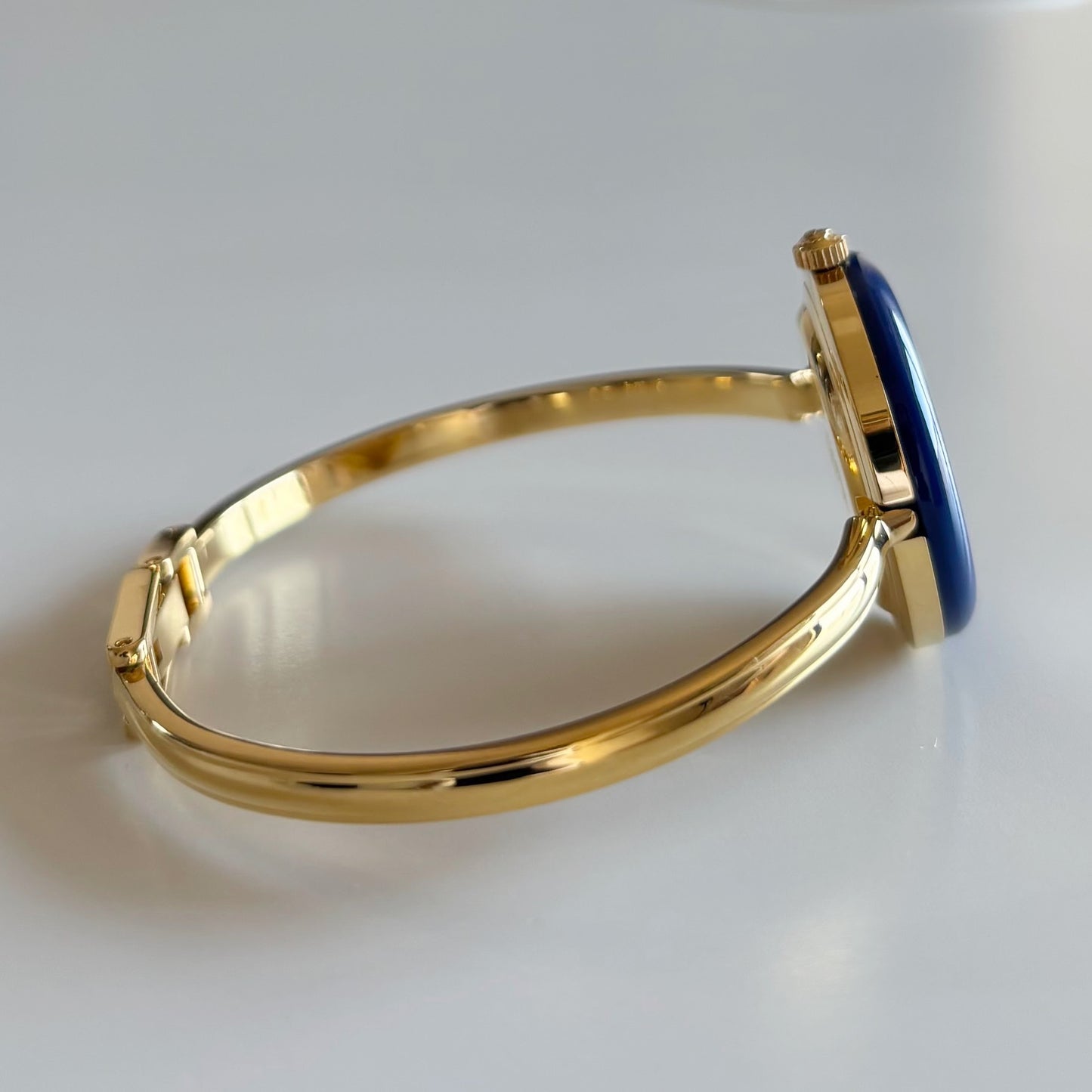 Gucci 1990s Interchangeable Bezel Gold Plated Bangle Watch with 12 bezels, case