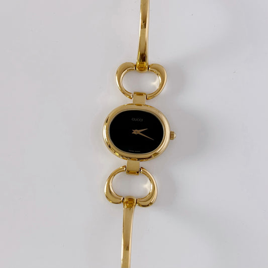 Gucci 1990s Black Dial Gold Plated Bangle Watch