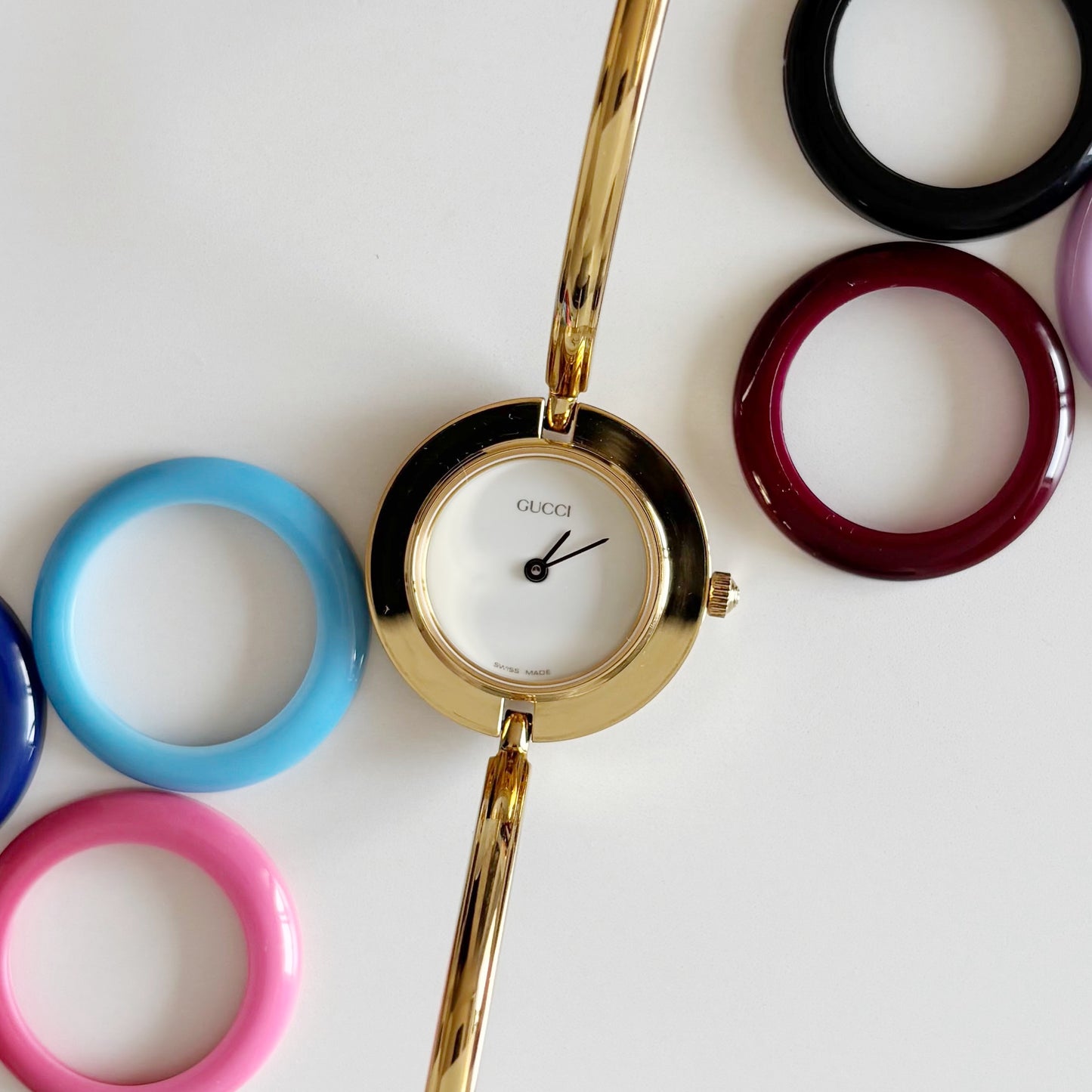 Gucci 1990s Interchangeable Bezel Gold Plated Bangle Watch with 12 bezels, case