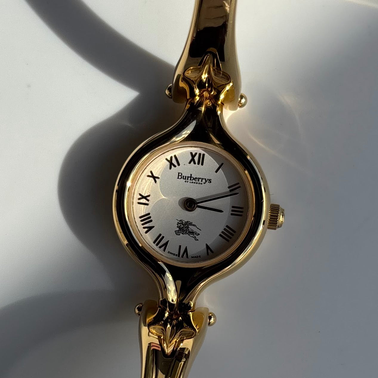 Burberry 1990s Round Dial Gold Plated Bangle Watch