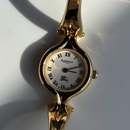 Burberry 1990s Round Dial Gold Plated Bangle Watch