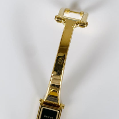 Gucci 1990s Black Dial Rectangular Gold Plated Bangle Watch