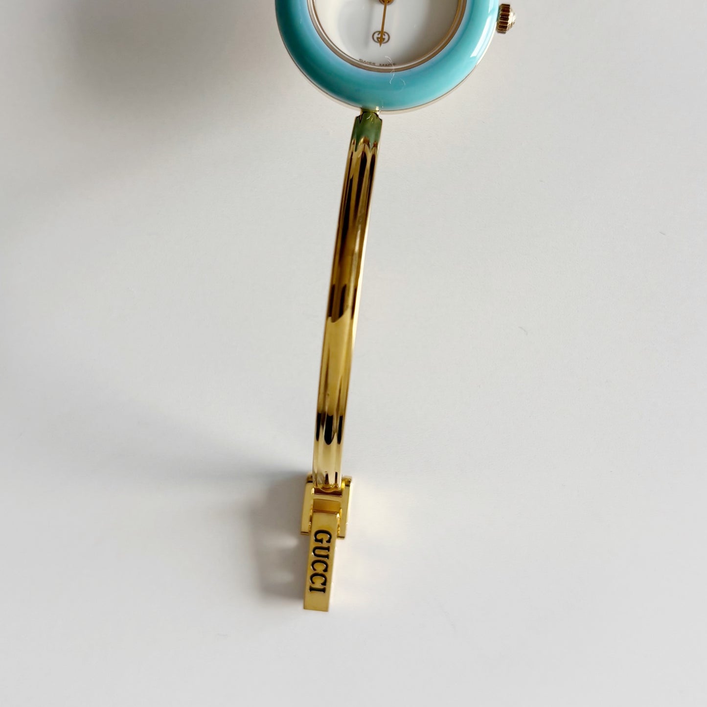 Gucci 1990s Interchangeable Bezel Gold Plated Bangle Watch with 12 bezels, case