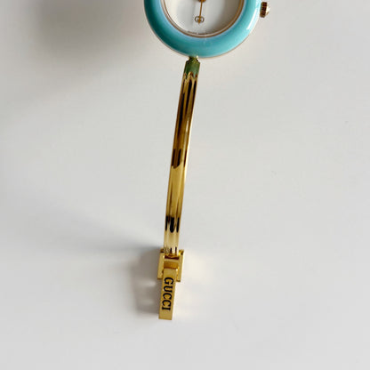 Gucci 1990s Interchangeable Bezel Gold Plated Bangle Watch with 12 bezels, case