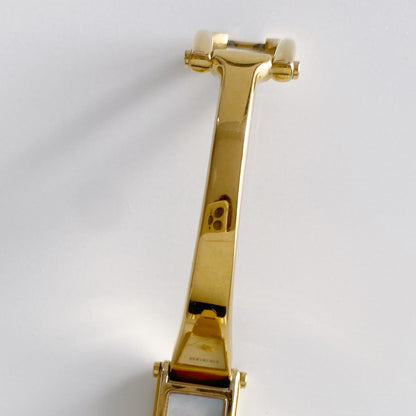 Gucci 1990s Seashell Dial Rectangular Gold Plated Bangle Watch