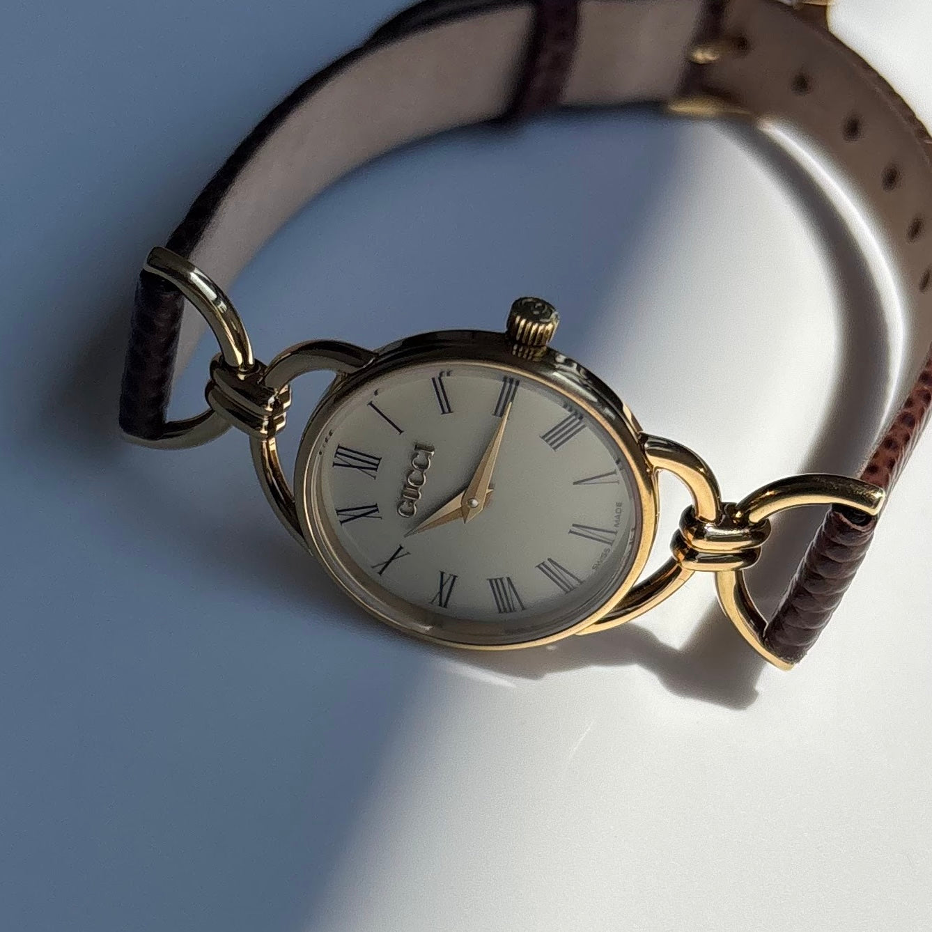 Gucci 1990s Round Cream Dial Horsebit Gold Plated Watch