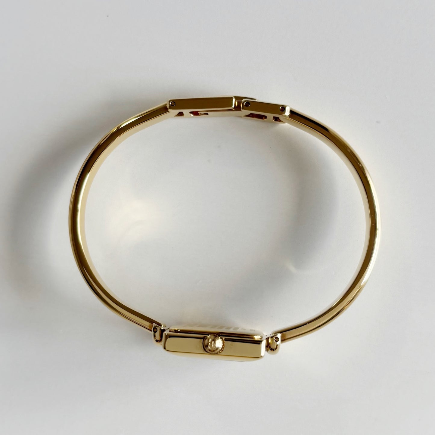 Gucci 1990s Square Dial Gold Plated Bangle Watch