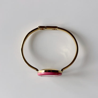 Gucci 1990s Interchangeable Bezel Gold Plated Bangle Watch with case, 12 bezels