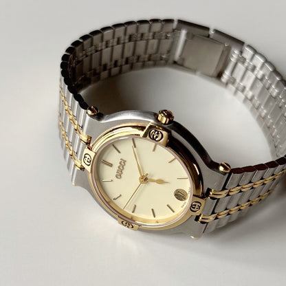 Gucci 1990s Round Dial Two Tone Gold Plated Watch (Large)