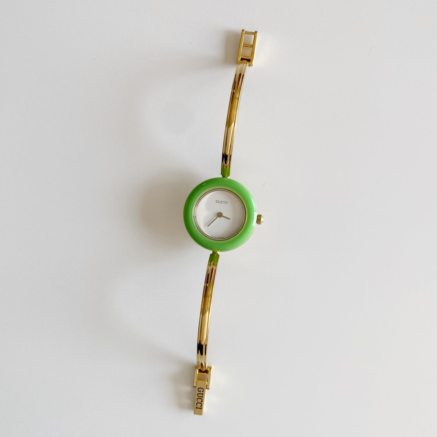 Gucci 1990s Interchangeable Bezel Gold Plated Bangle Watch with 12 bezels, case (Small)