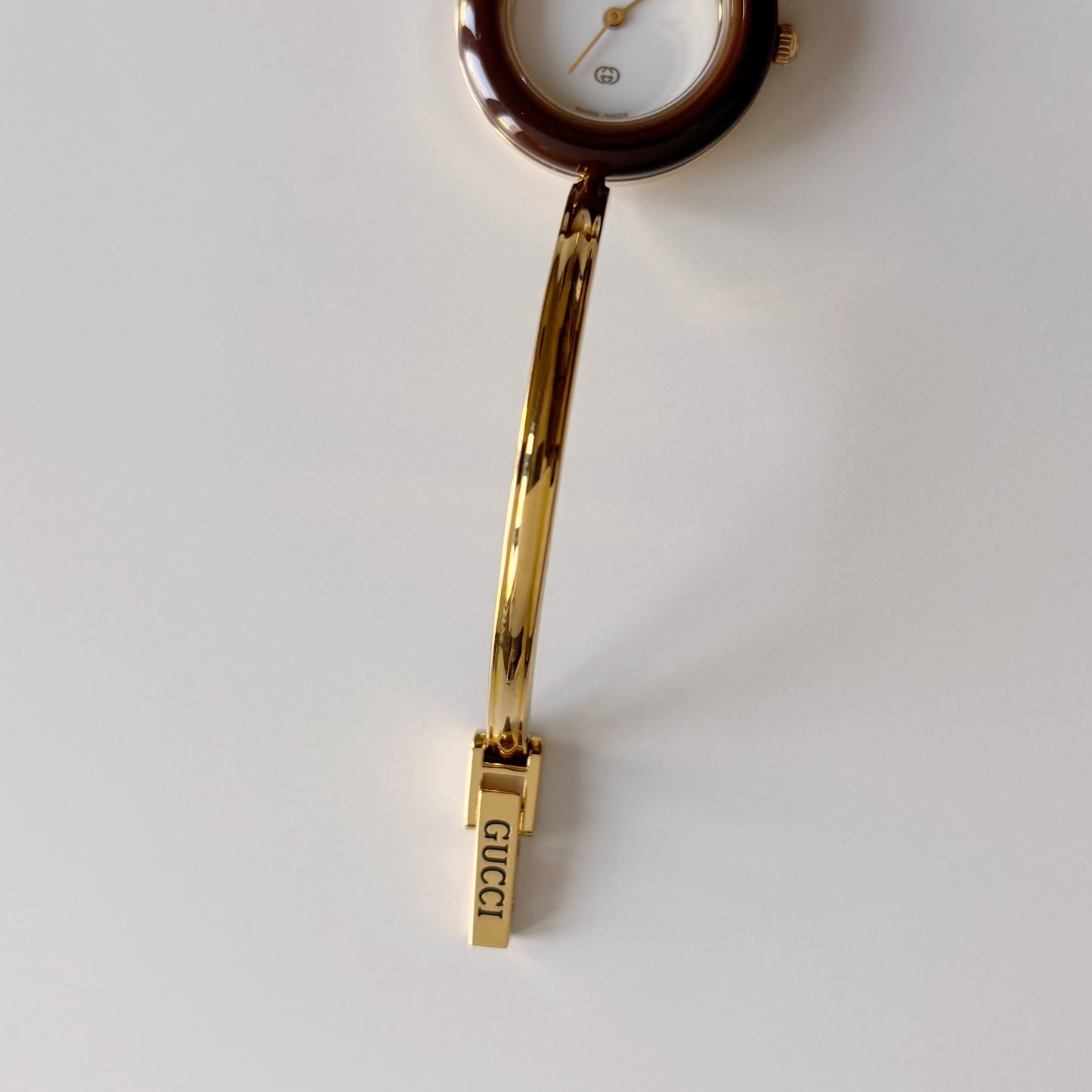 Gucci 1990s Interchangeable Bezel Gold Plated Bangle Watch with 12 bezels, case