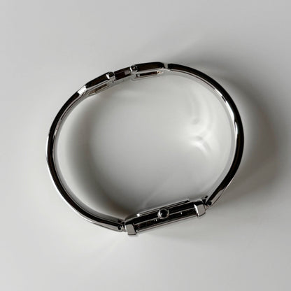 Yves Saint Laurent 1990s Black Dial Silver Bangle Watch