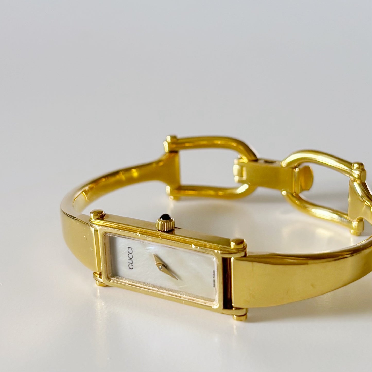 Gucci 1990s Rectangular Seashell Dial Gold Plated Bangle Watch