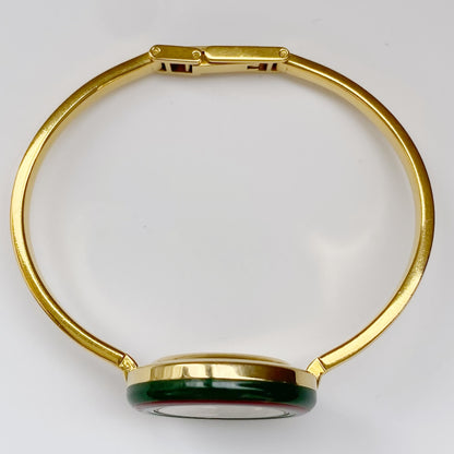 Gucci 1990s Interchangeable Bezel Gold Plated Bangle Watch with 12 bezels, case