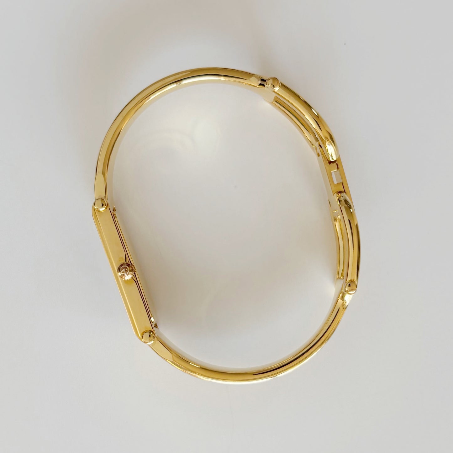 Gucci 1990s Black Rectangular Dial Gold Plated Bangle Watch