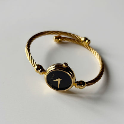 Gucci 1990s Black Dial Gold Plated Cable Bangle Watch
