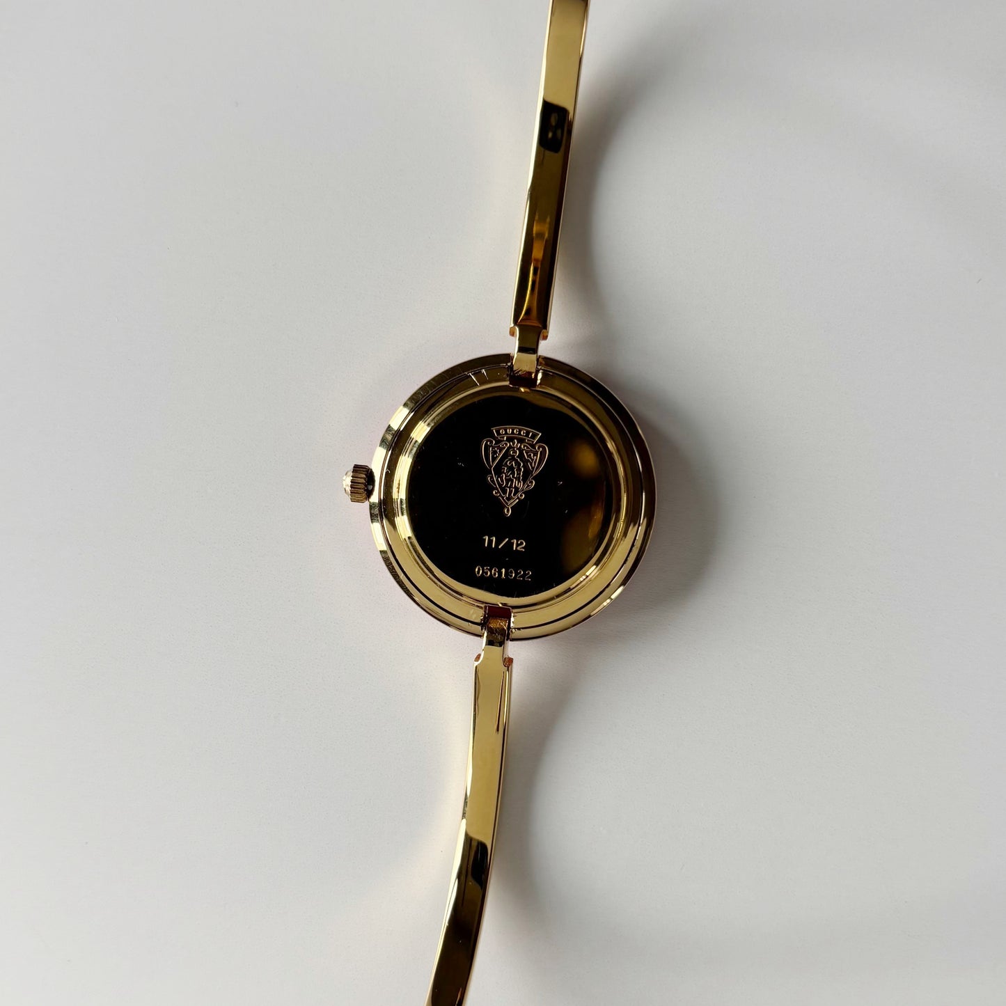 Gucci 1990s Interchangeable Bezel Gold Plated Bangle Watch with 12 bezels, case