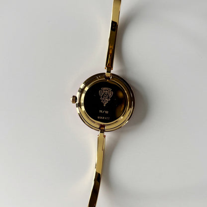 Gucci 1990s Interchangeable Bezel Gold Plated Bangle Watch with 12 bezels, case