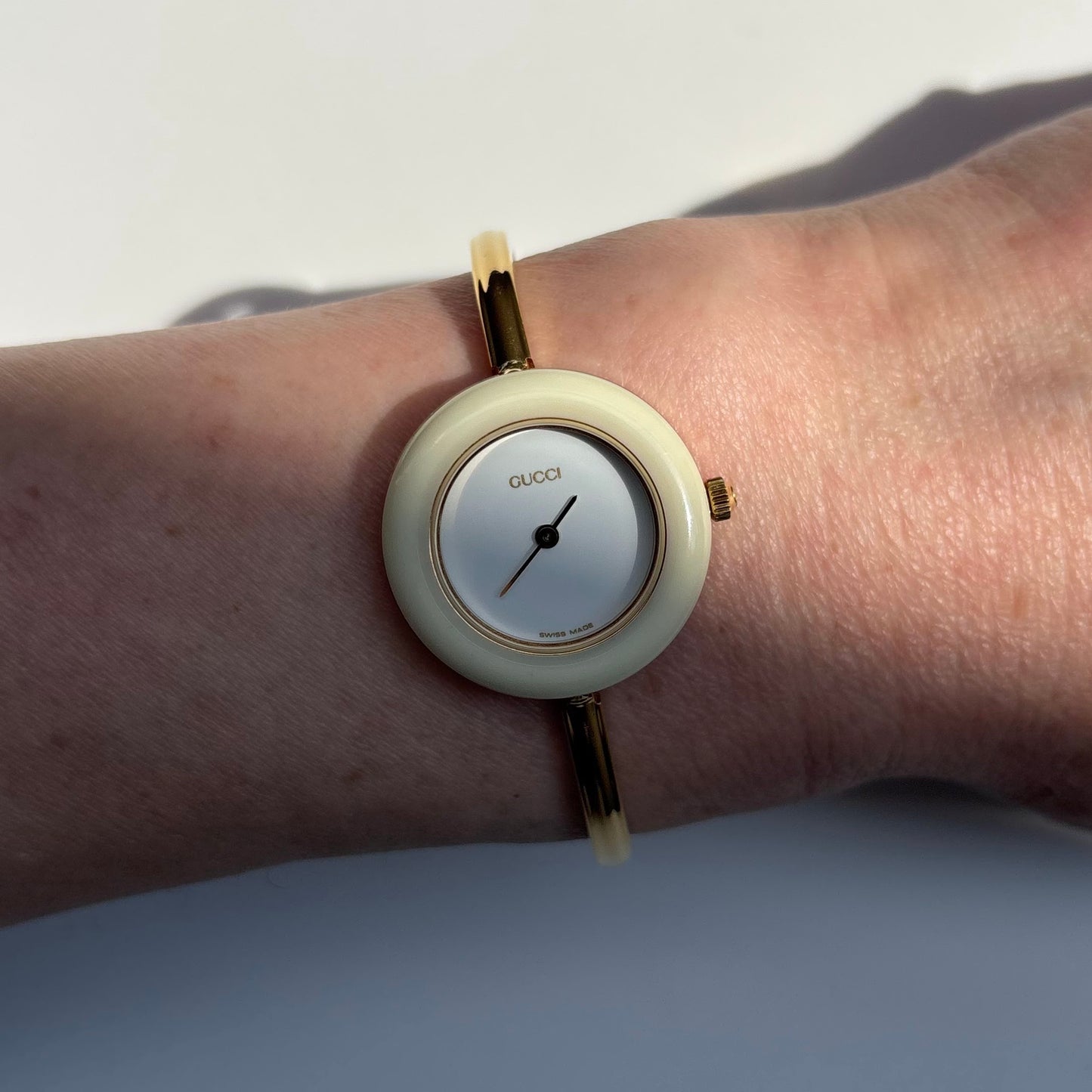 Gucci 1990s Interchangeable Bezel Gold Plated Bangle Watch with 12 bezels, case