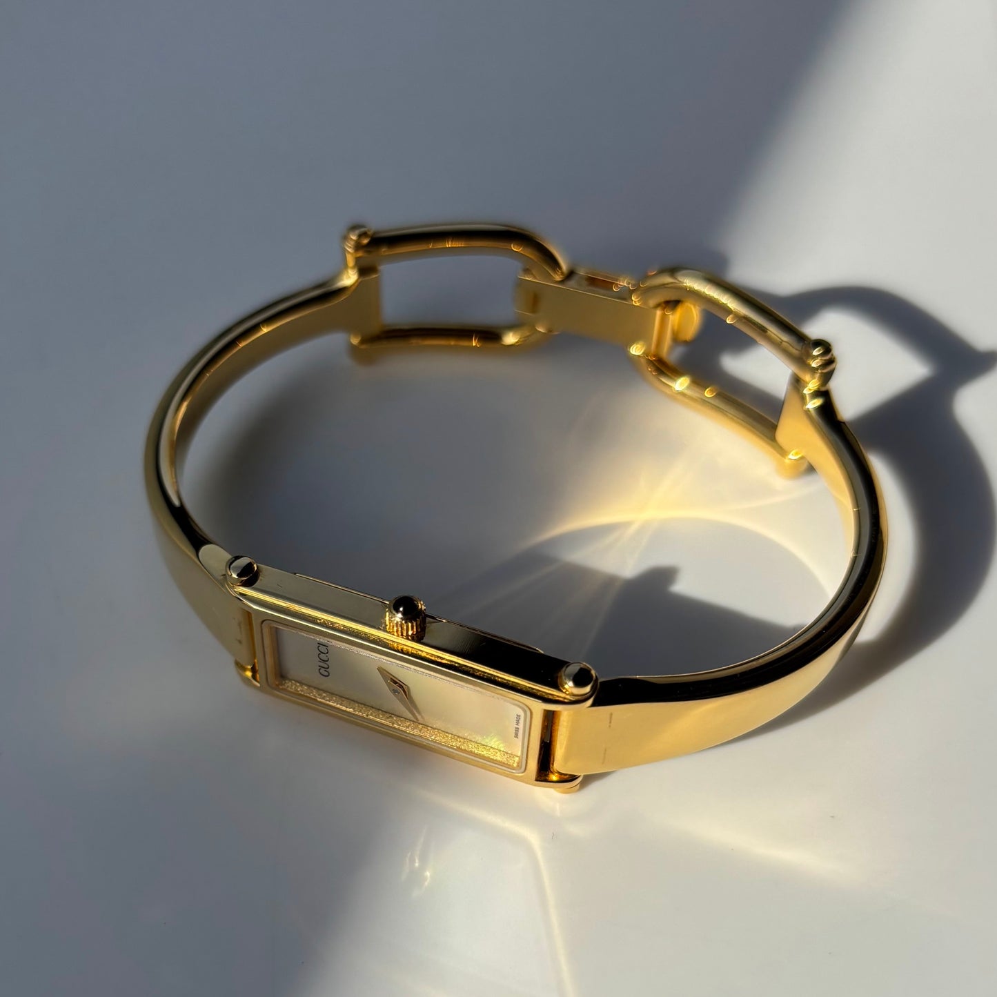 Gucci 1990s Seashell Dial Rectangular Gold Plated Bangle Watch