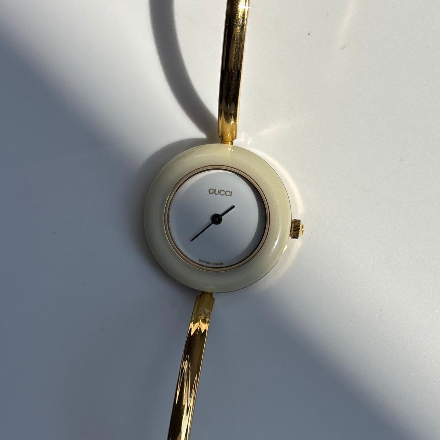 Gucci 1990s Interchangeable Bezel Gold Plated Bangle Watch with 12 bezels, case