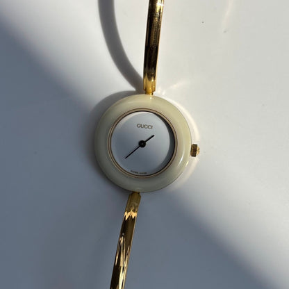 Gucci 1990s Interchangeable Bezel Gold Plated Bangle Watch with 12 bezels, case