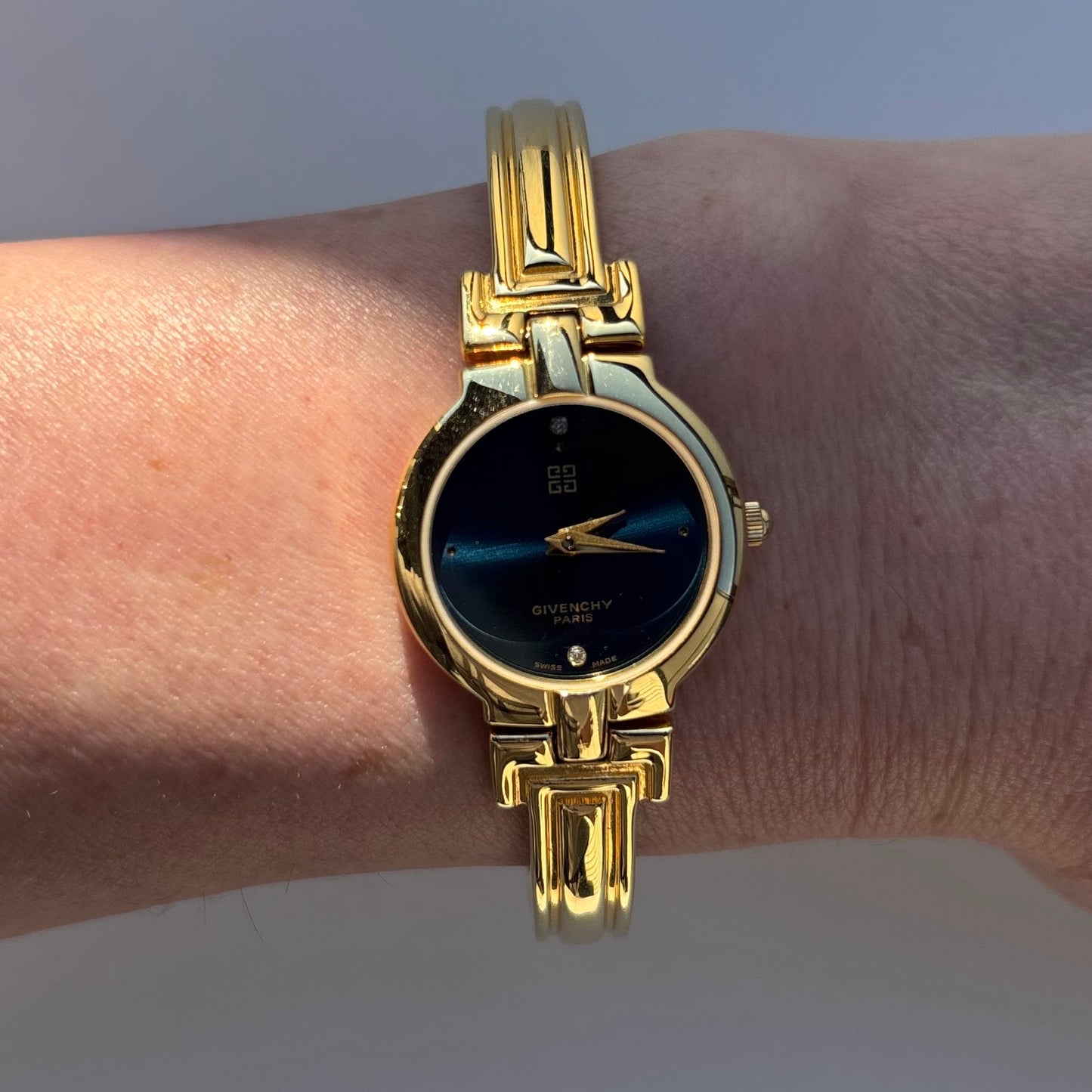 Givenchy 1990s Navy Round Dial Gold Plated Bangle Watch