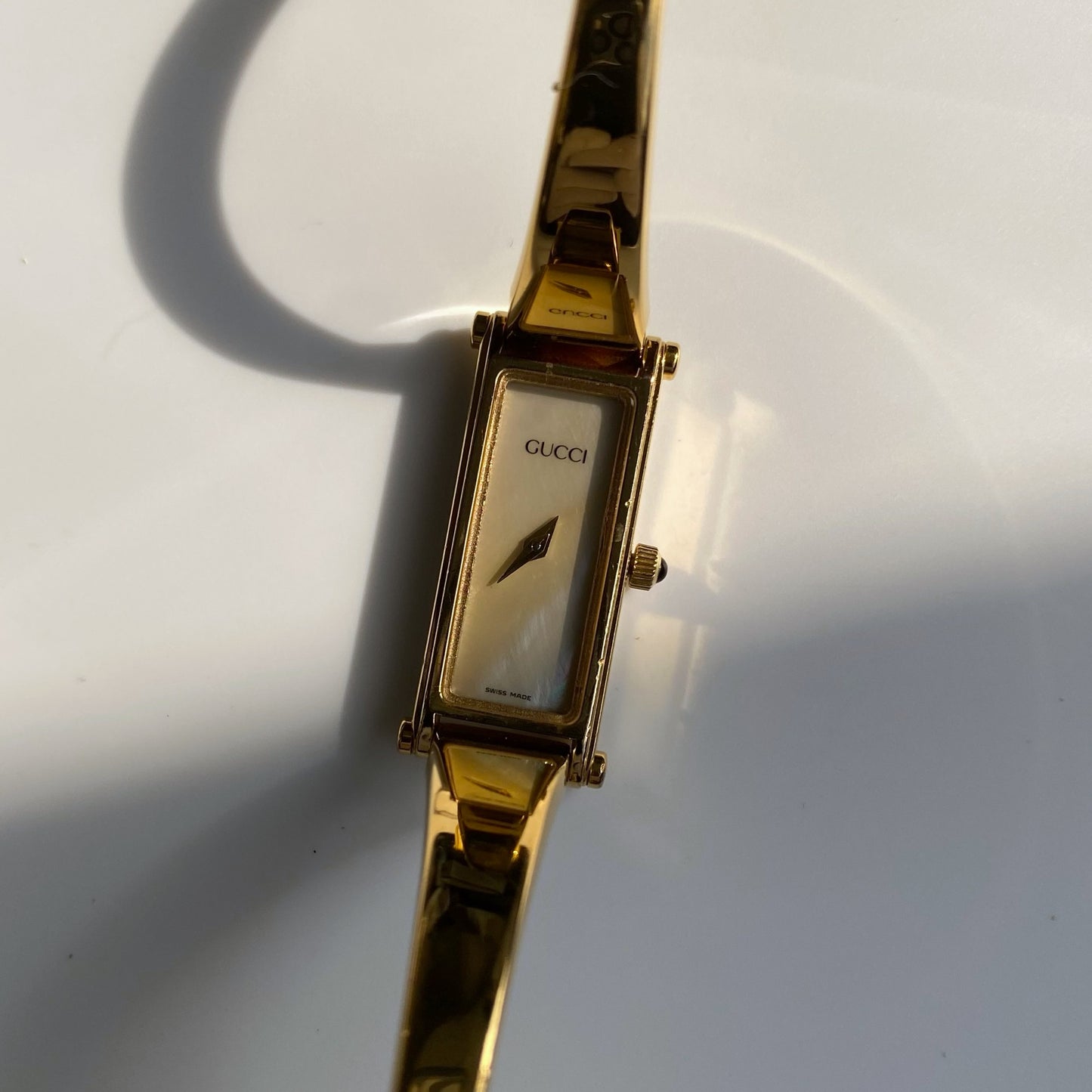 Gucci 1990s Rectangular Seashell Dial Gold Plated Bangle Watch