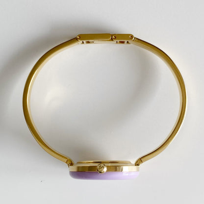 Gucci 1990s Interchangeable Bezel Gold Plated Bangle Watch with 12 bezels, case