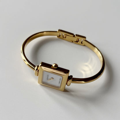 Gucci 1990s Square Dial Gold Plated Bangle Watch