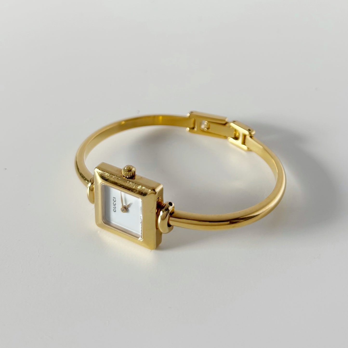 Gucci 1990s Square Dial Gold Plated Bangle Watch