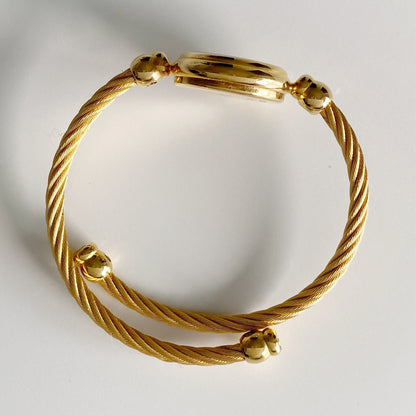 Gucci 1990s Black Dial Gold Plated Cable Bangle Watch