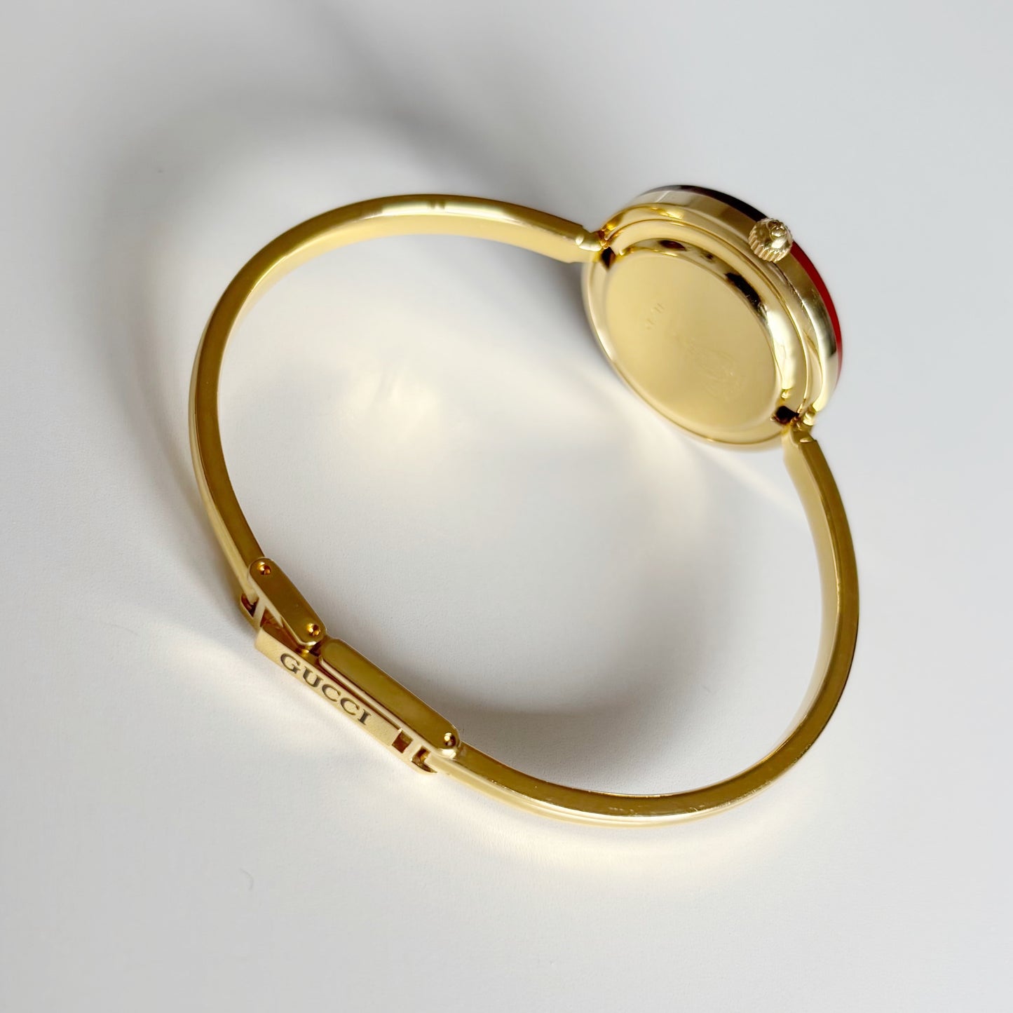 Gucci 1990s Interchangeable Bezel Gold Plated Bangle Watch with 12 bezels, case