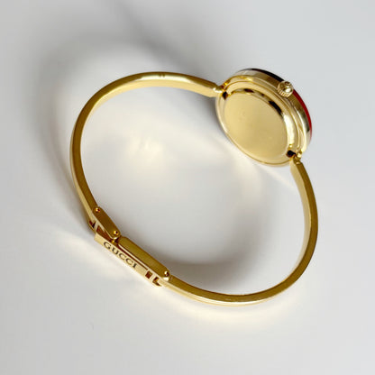 Gucci 1990s Interchangeable Bezel Gold Plated Bangle Watch with 12 bezels, case