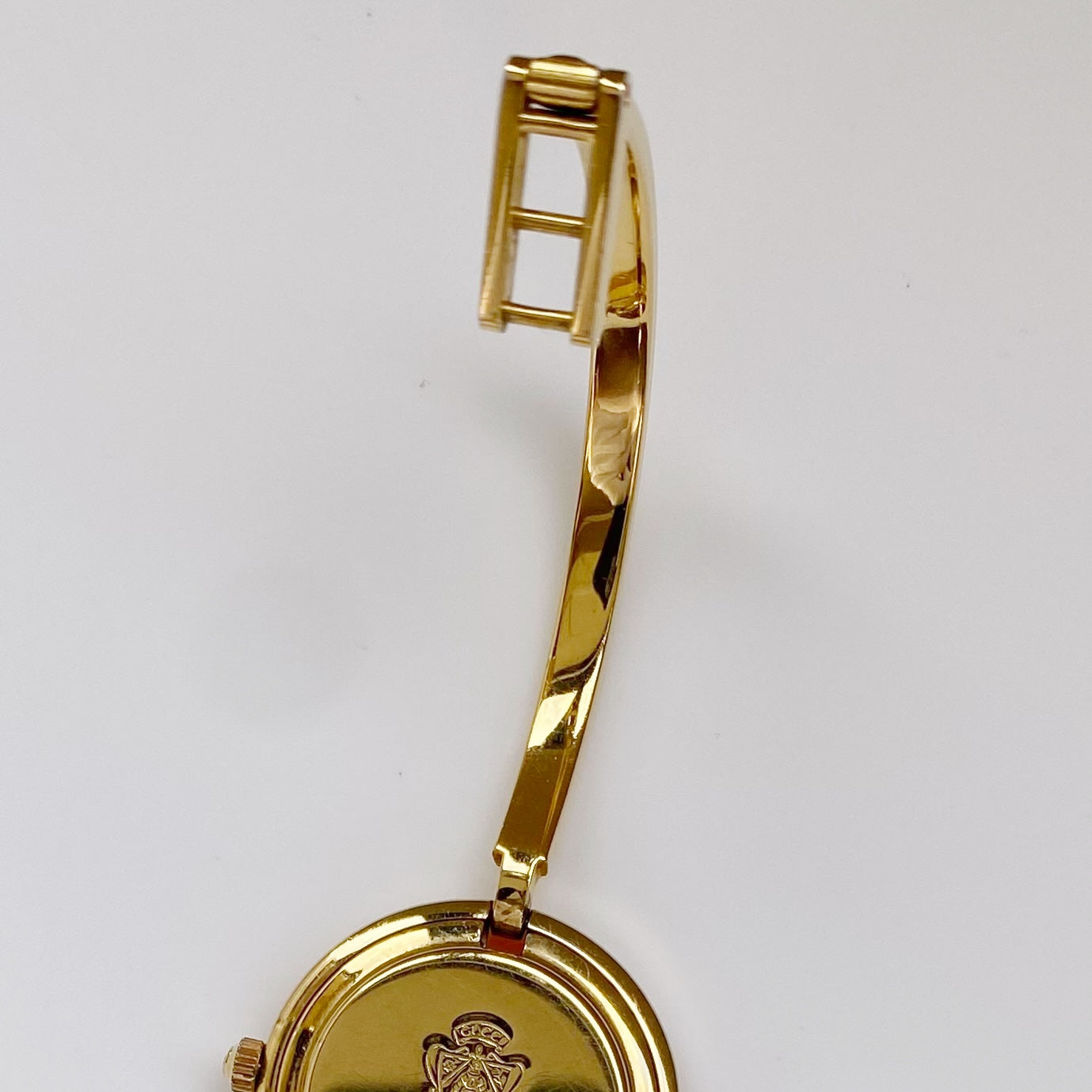 Gucci 1990s Interchangeable Bezel Gold Plated Bangle Watch with 12 bezels, case