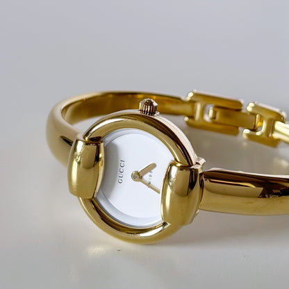 Gucci 1990s Round Dial Gold Plated Bangle Watch